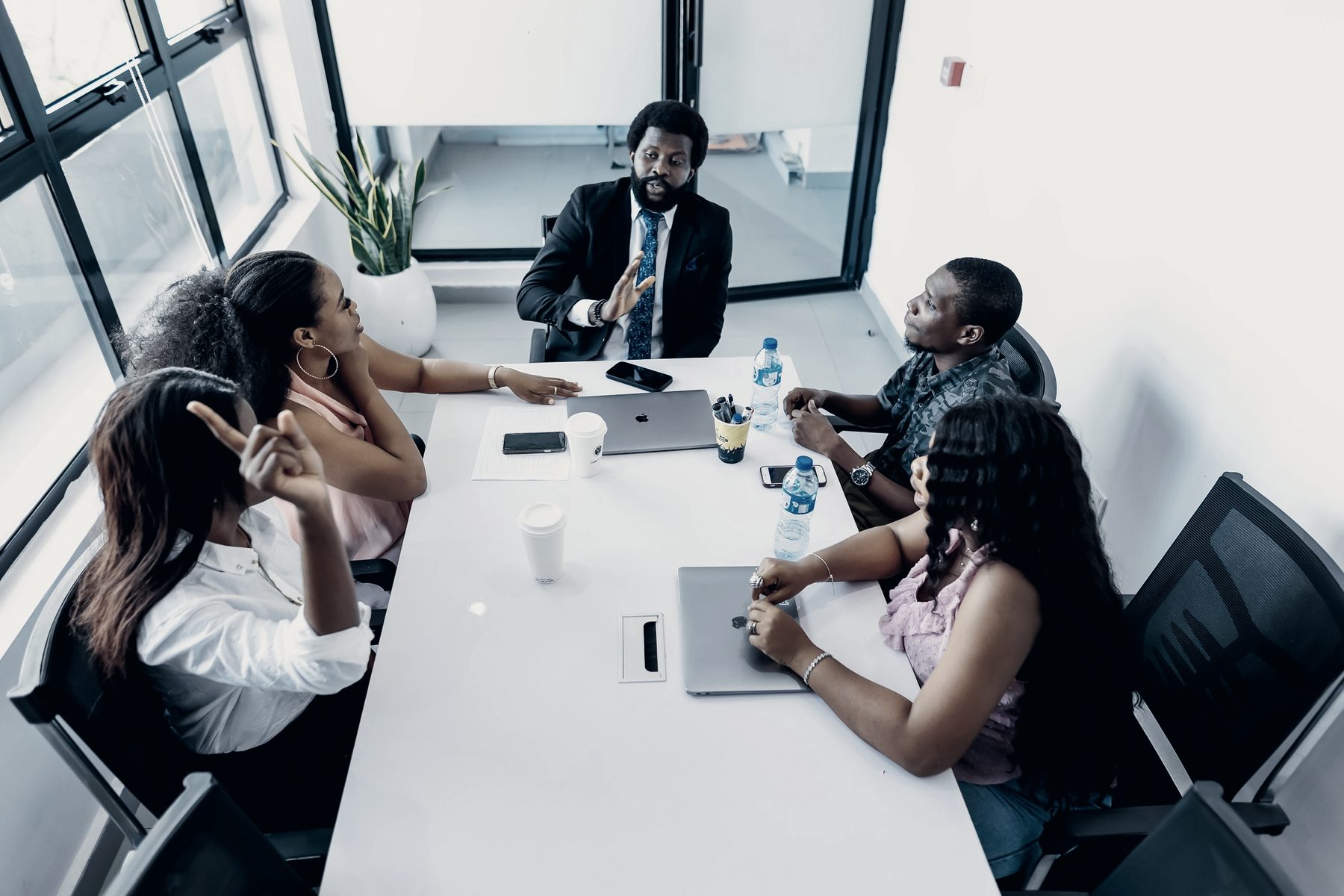 Colleagues in a meeting around a table